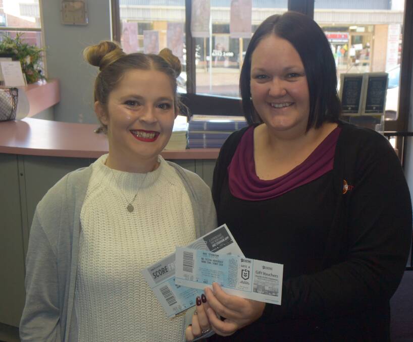 SHOW ME THE TICKETS: Lithgow Mercury sales representative Angie Cambourn with Rebecca Christie from Westfund. 