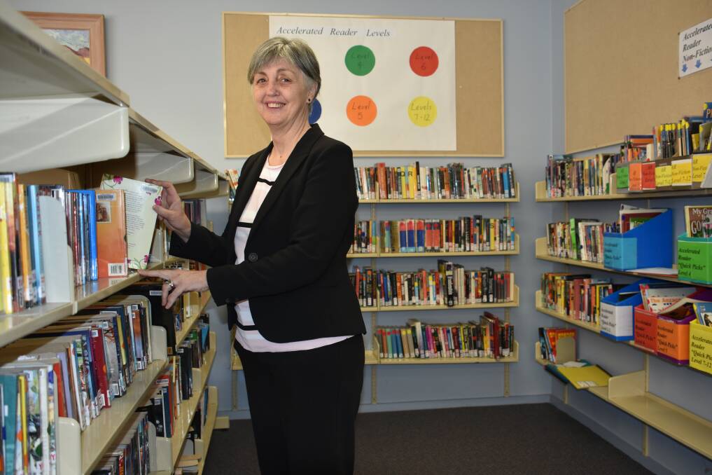 Bernadette Hicks at home in La Salle Academy's library. Picture: KIRSTY HORTON. 
