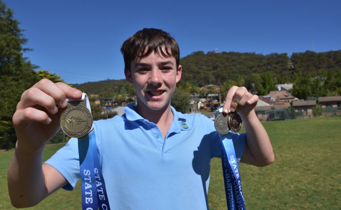 A STACK OF MEDALS: Angus Clues has won out again at the Little Athletics State Track and Field Championships.