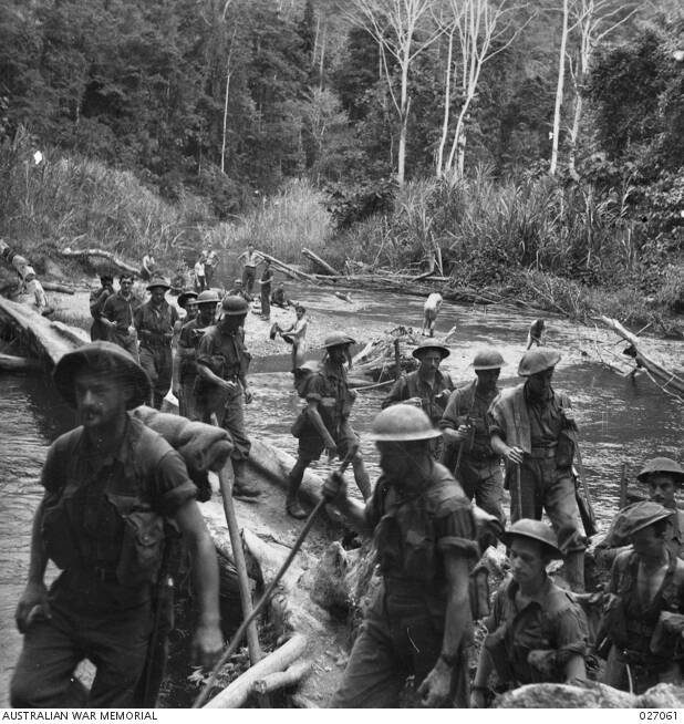 NEW GUINEA: A patrol of 2/25th and 2/33rd Australian Infantry Battalions. Picture: 027061 AWM



crossing the Brown River on their way to Menari