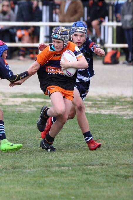 ATTACKING RUN: Eli Morris from the Storm Under 13's in action. Picture: SUPPLIED. 