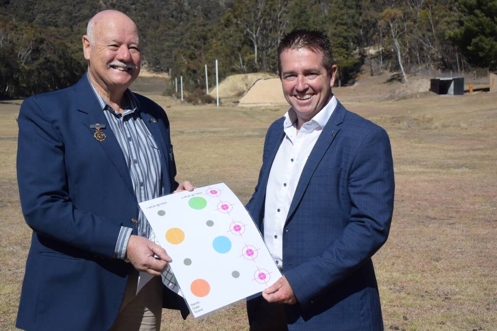 ON TARGET: Lithgow Small Arms Rifle Club's John Baxter with MP Paul Toole at the range. Picture: KIRSTY HORTON. 