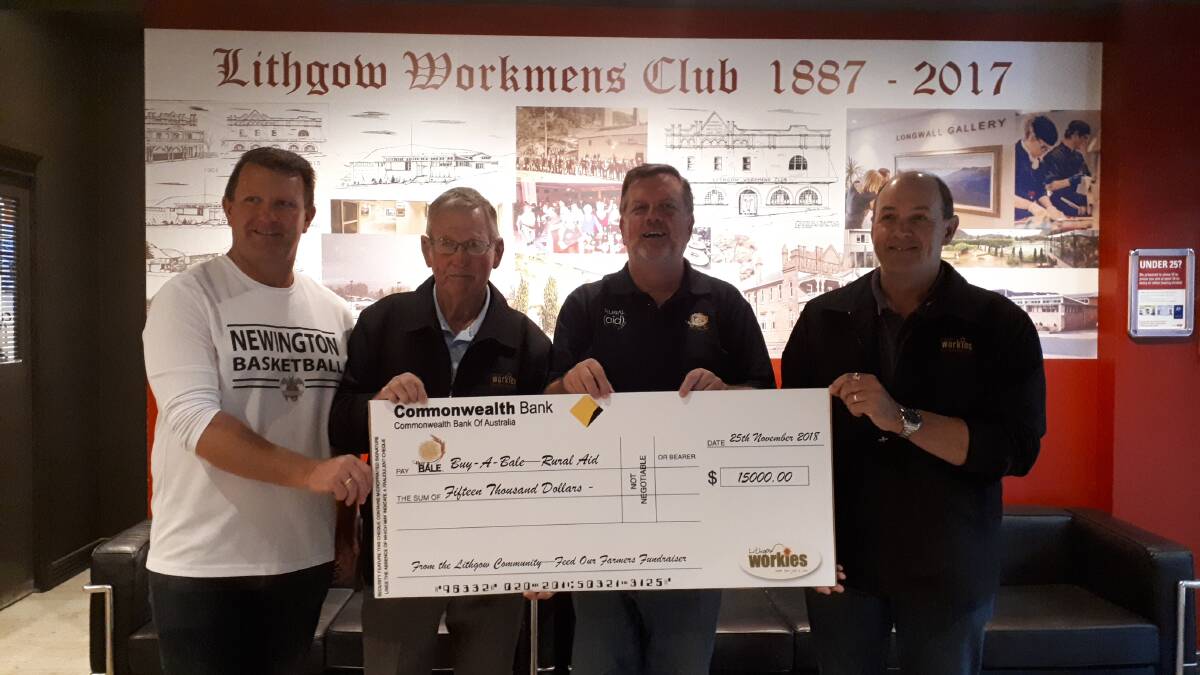 SUPPORT: Lithgow Workies directors Darryl Goodwin, Ray Warren and Michael Quinn with Buy-A-Bale Rural Aid’s general manager Wayne Thomson. Picture: SUPPLIED. 