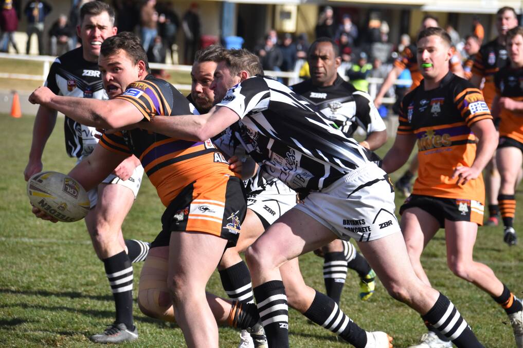 FIGHTING HARD: The Lithgow Workies premier league put in a big fight against Cowra Magpies in their last game of the season. Picture: KIRSTY HORTON. 