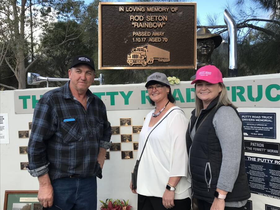 MEMORIAL: Rod's children, Matthew, Nicola and Cherie Seton, with the plaque. Picture: SUPPLIED.