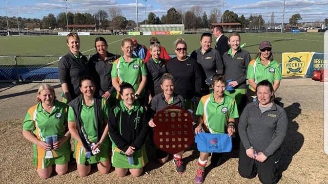 TROPHY TIME: Lithgow team members with their first place trophy. Picture: SUPPLIED. 