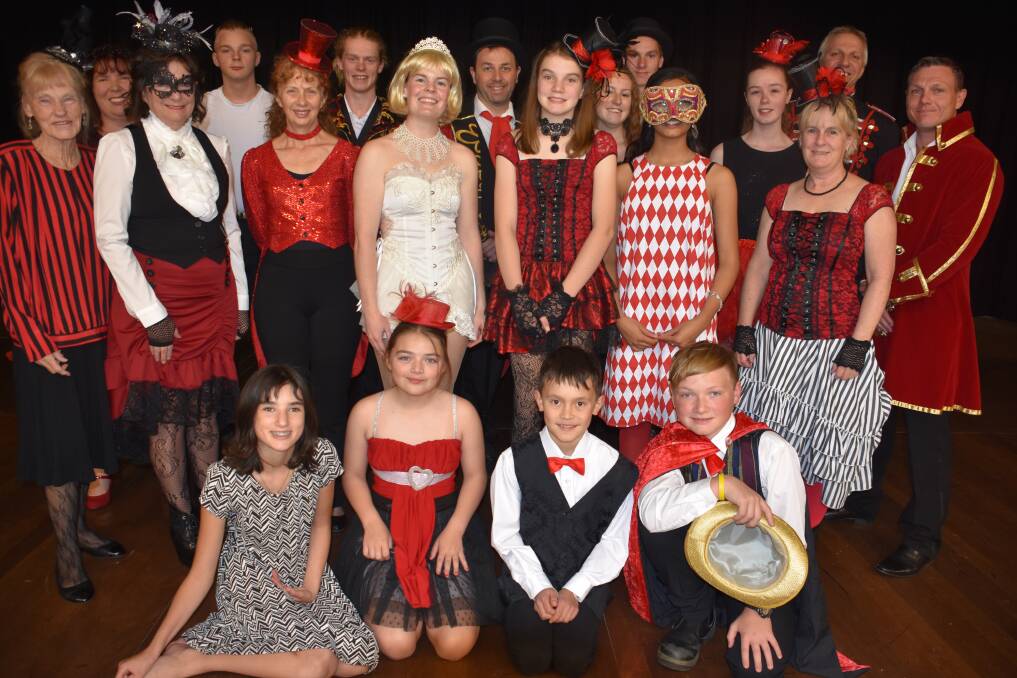COLOURFUL CAST: Most of the cast of the Lithgow Musical Society's Greatest Hits in Concert series gather for a photo in some of their costumes. Picture: KIRSTY HORTON. 