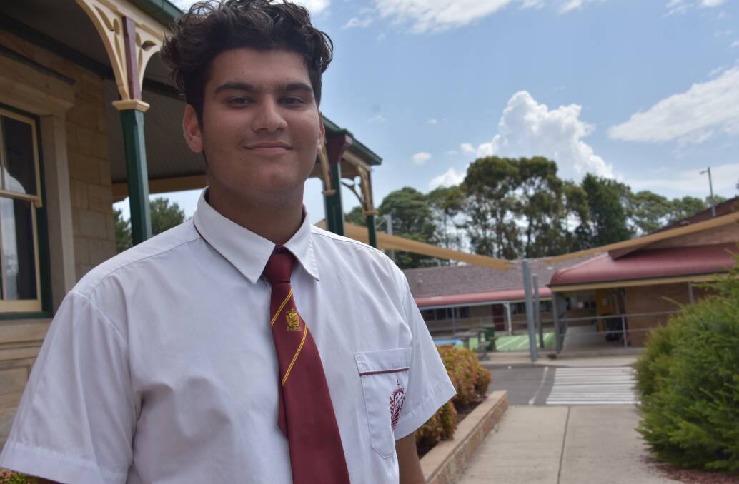 READY TO ROLL: Tanvir Singh, not with the ball, but in his uniform. He's a Year 12 student at La Salle Academy. Picture: KIRSTY HORTON. . 