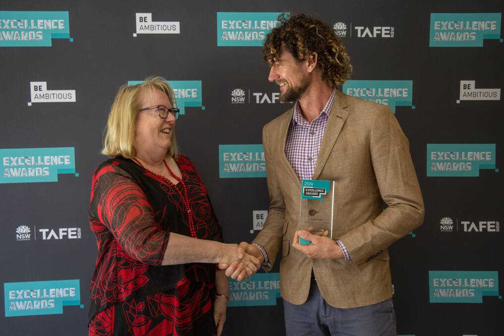 AWARD WINNER: Lithgow TAFE's Jeremy Kenny receives his prestigious award for his hard work and academic achievement. Picture: SUPPLIED.
