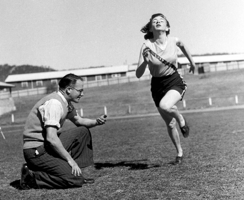 LITHGOW FLASH: Marjorie Jackson-Nelson training for running back in 1950s with Jim Monaghan. PHOTO: Fairfax Media.
