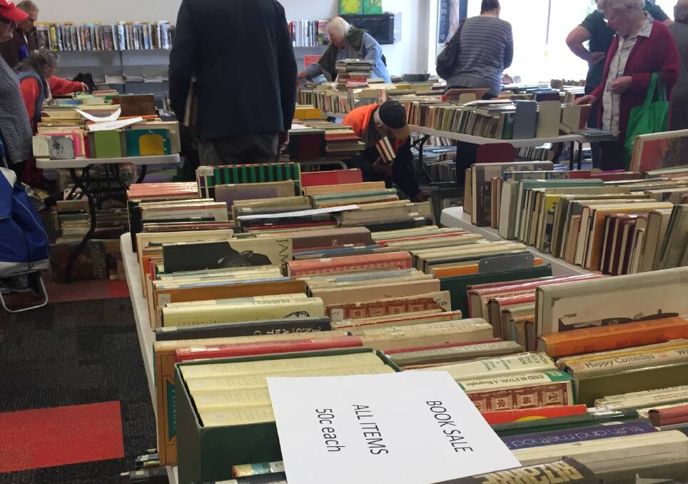 Patrons browse at the Lithgow library's recent book sale. 