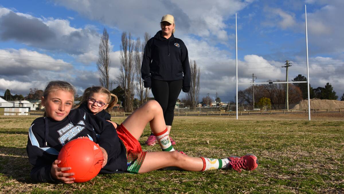  A POWERHOUSE: Gabrielle with her sister Georgie and mum Gena at the Wallerawang playing fields. Picture: KIRSTY HORTON.
