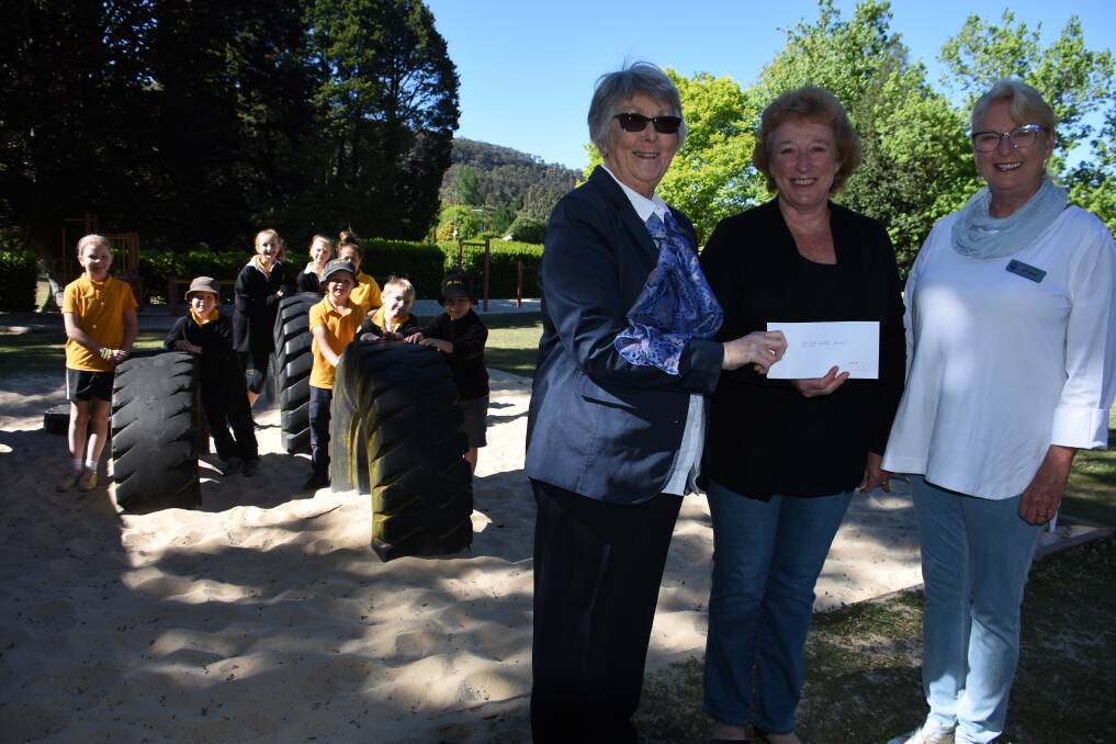Zig Zag Public School students and principal Vicki Gilmore (centre) welcome the donation from Quota Lithgow's Noela Williams and Joy Smith. Pictures: KIRSTY HORTON. 