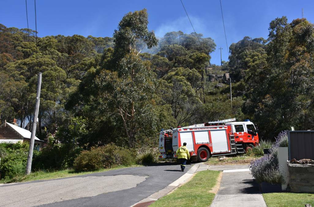 Fire crews at the site of a deliberately lit fire at the top of Eskbank Street, Lithgow in December 2018. 