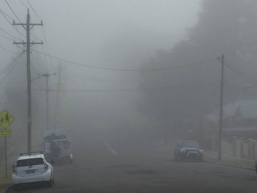 LOOKING DOWN ON MAIN STREET: Where is it? This morning's fog blanketed Lithgow and surrounds. Picture: KIRSTY HORTON. 