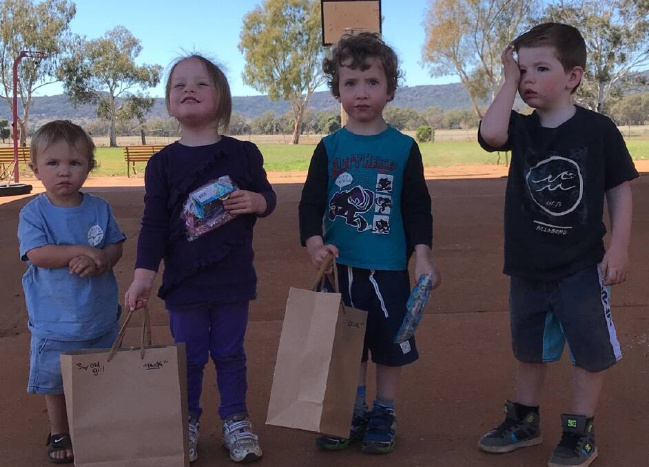 Tooraweenah students receive their care packages. Pictures: SUPPLIED. 