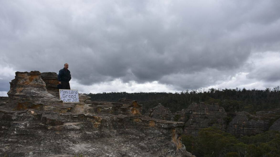 SIGN: Harry Gian of the Combined Retired Union Members Association stands on a pagoda at Dobbs Drift Lookout. FILE IMAGE. 