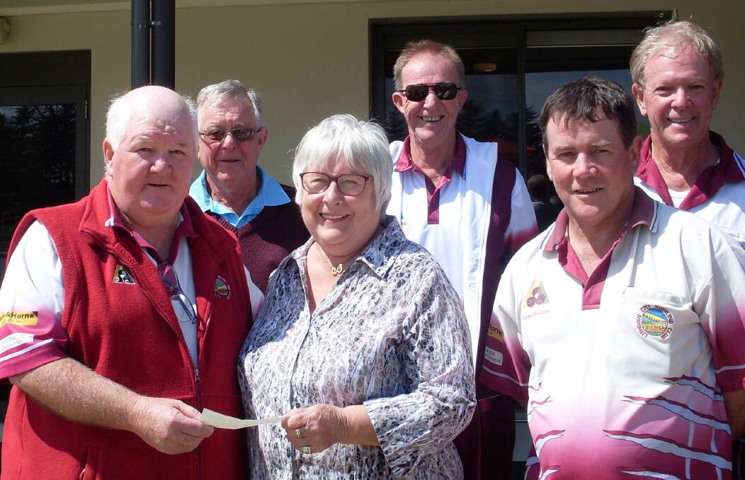 SUPPORT: Lithgow City Men's Bowling Club representatives Jim Bannerman, Allan Kenniff, Col Watton, Mark Allan and Wayne Allan hand over a fundraising cheque to Anne Anderson from Lithgow Hospital Auxiliary. Picture: SUPPLIED. 