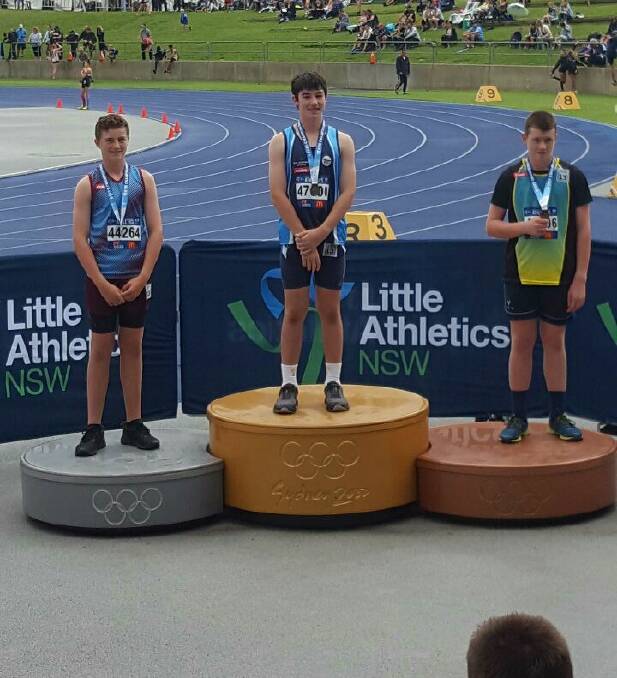 GOLD: Angus Clues on the podium at the State Athletics. Picture: SUPPLIED. 