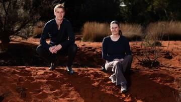 Not Mars but the botanical gardens. Dr Lex van Loon and Dr Emma Tucker at the Red Centre Garden, Australian National Botanic Gardens in Canberra. Picture: Tracey Nearmy/ANU