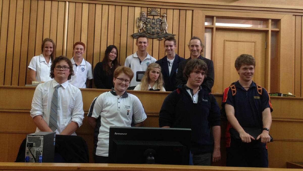 PROTECTING THEIR DEFENDANT: The Lithgow High legal team members Amy Capaldi, Jarod Inzitari, Zyrell Puddle, Max Arkley-Smith, Matthew Palmer and Brittany Menzies mix in with members of the prosecution. 	