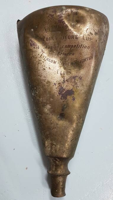 The damaged Lithgow L.S.C Point Score Cup.