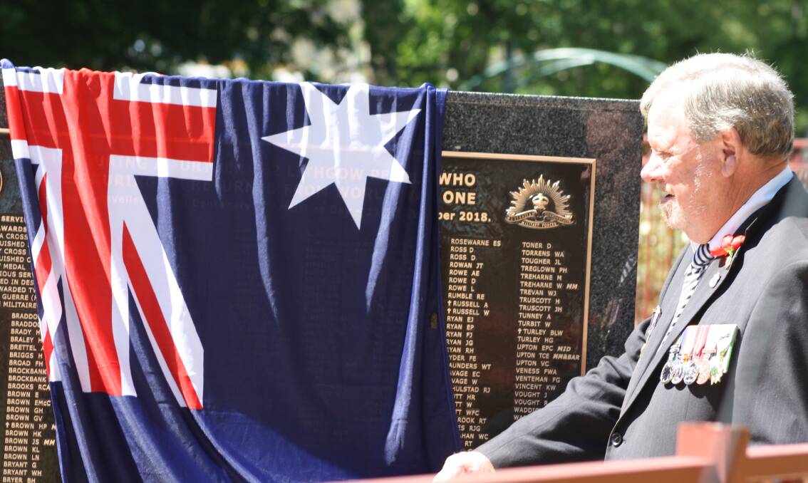 DREAM FULFILLED: Ian Burrett helps to unveil the new list of WWI soldiers honoured at the Lithgow war memorial in 2019.