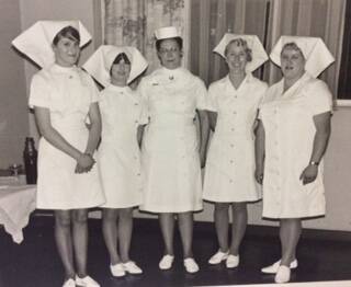 NURSES: Kay Ross with new graduates in late sixties. Photo: Submitted