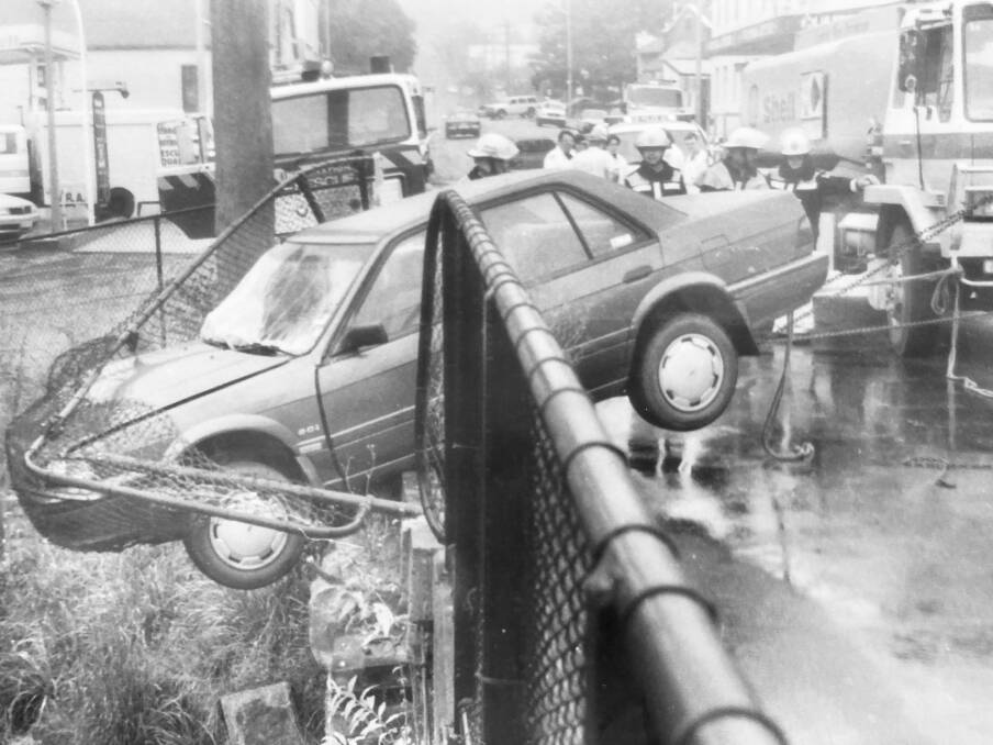 FLASHBACK FRIDAY: Lifes embarrassing moments in a past life when a wet road led to a precarious outcome on the Bridge Street railway bridge. History repeats and the bridge is now waiting repairs after another such nudge.