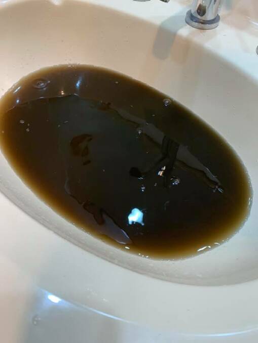 BROWN: The water stained the sink. Picture: SUPPLIED.