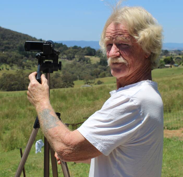 THE TRUTH IS OUT THERE: Lithgow's Dennis McMurtrie with the camera he uses to document the night sky, outside his home in South Bowenfels. PHOTO: Jacob Gillard. lm112416den