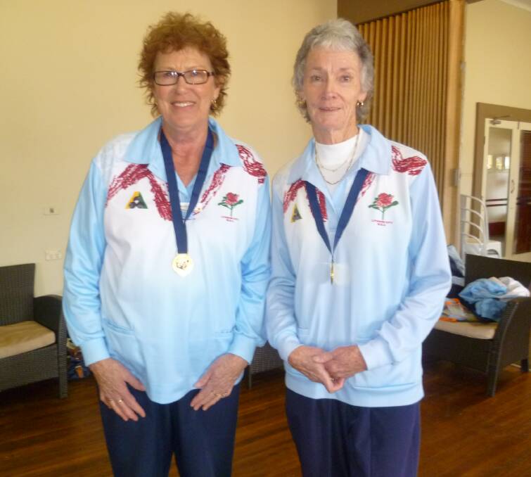 PERFECT PAIR: Carolyn Lord and Pam Johnson sporting their new medals from the Zone Pairs final at Bathurst City. PHOTO: Supplied. lm080916bowl.