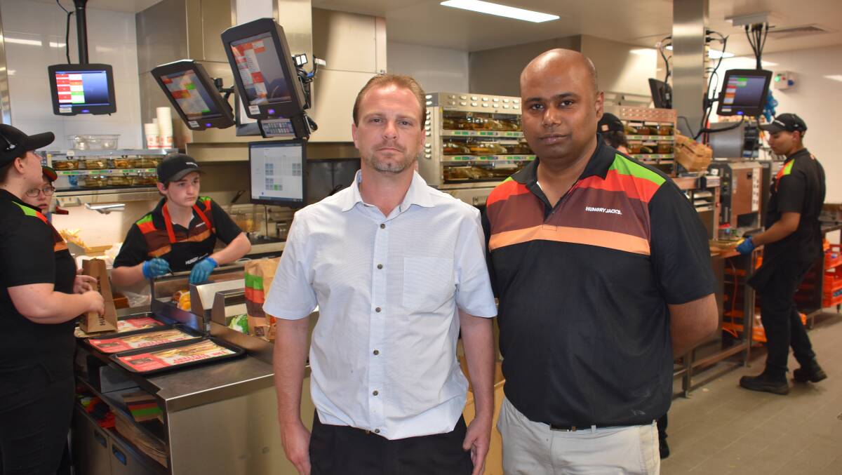 FLAME-GRILLED FLAVOUR: District manager David Wells and regional manager Nitin Mattal. Picture: ALANNA TOMAZIN.