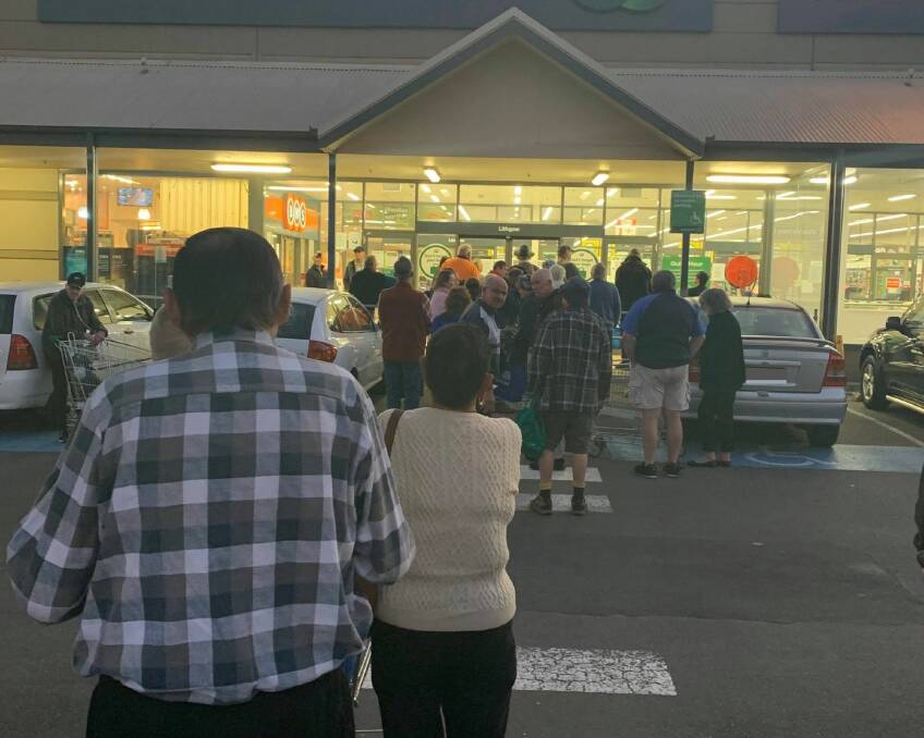 PANIC BUYERS: Shoppers line up outside Woolworths Lithgow at 6.30am. Picture: SUPPLIED.