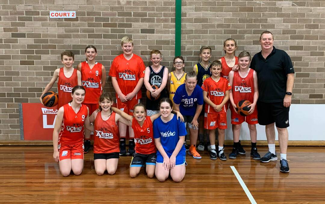 CHANCE TO LEARN: Rob Beveridge (right) with Lithgow juniors at the camp.