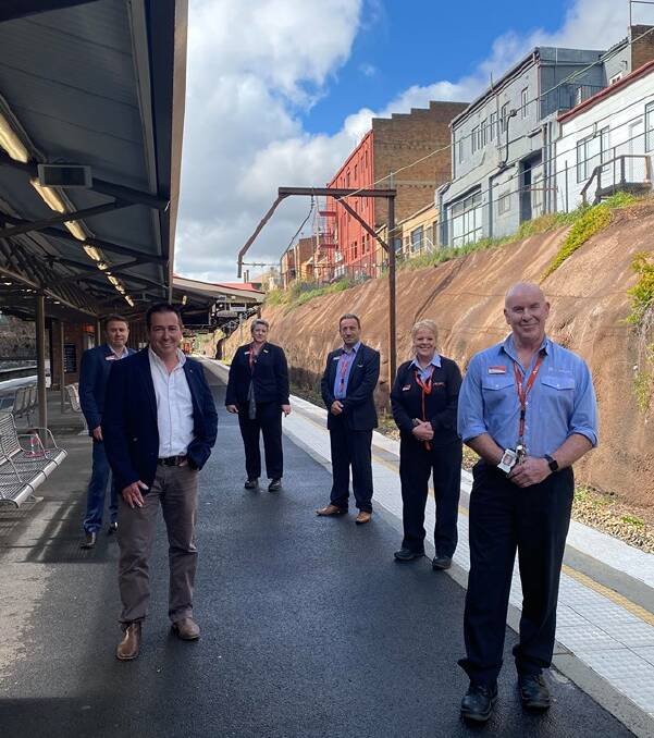 BACK ON TRACK: Minister for Regional Transport and Roads Paul Toole, NSW TrainLink director for South West Michael Dorrain, West area manager Tiffany Glasgow, South West associate director Mark Kourouche, Lithgow staff manager Jo Hall and Lithgow station manager Pat Wall. Picture: ALANNA TOMAZIN.