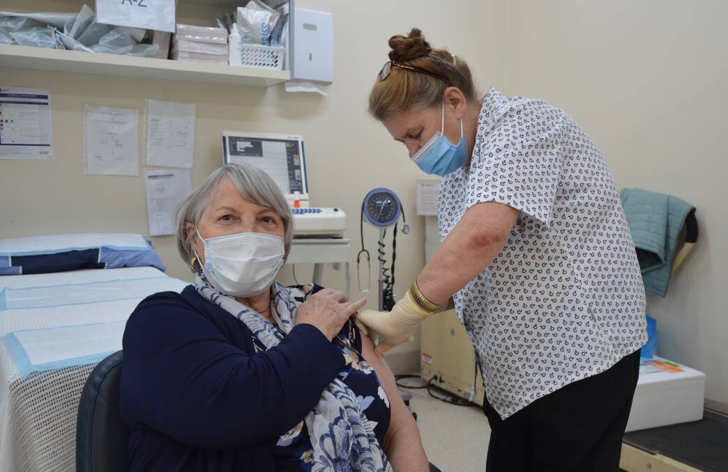COVID JAB: Resident Sheila Jordan receives her second dose of AstraZeneca from practice nurse Jan Collins. Photo: ALANNA TOMAZIN