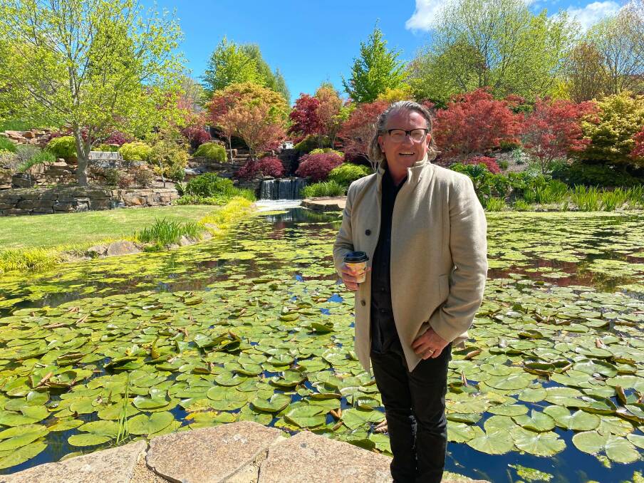 A STUNNING BACKDROP: Mayfield Garden's Chris Muldoon enjoying the European style garden. Picture: ALANNA TOMAZIN