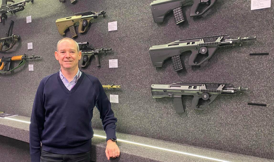 SUPPORTING SOLDIERS: Thales Lithgow Arms general manager Bruce Hutton with some of the locally-made guns. Photo: ALANNA TOMAZIN.