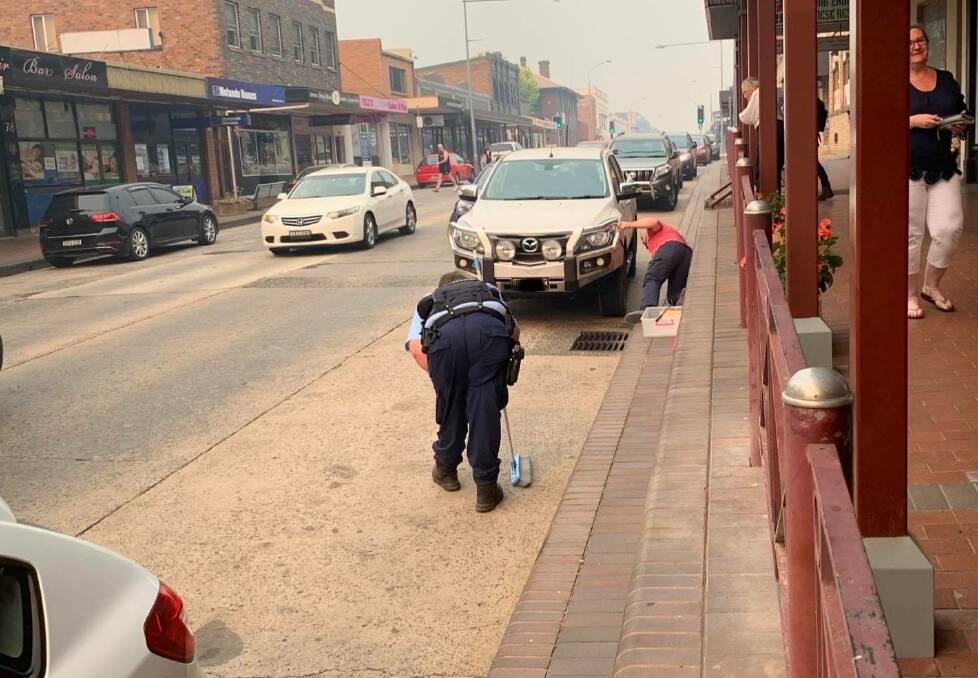 ON CALL: Lithgow Police officers turned snake catchers for the afternoon. Picture: ALANNA TOMAZIN.