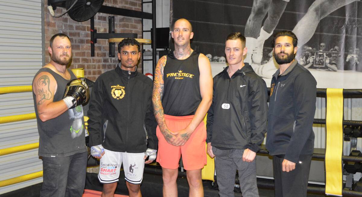 PRESTIGE FIGHTERS: Coach Brett Smith, fighers Pawan Gajula, Reece Brown and Joel Walsh with owner/coach Roger Spence. Photo: ALANNA TOMAZIN.