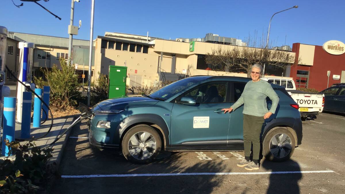 CHARGING UP: Charles' wife Carol testing out Lithgow's NRMA fast chargers at the Lithgow Workies. Picture: SUPPLIED.