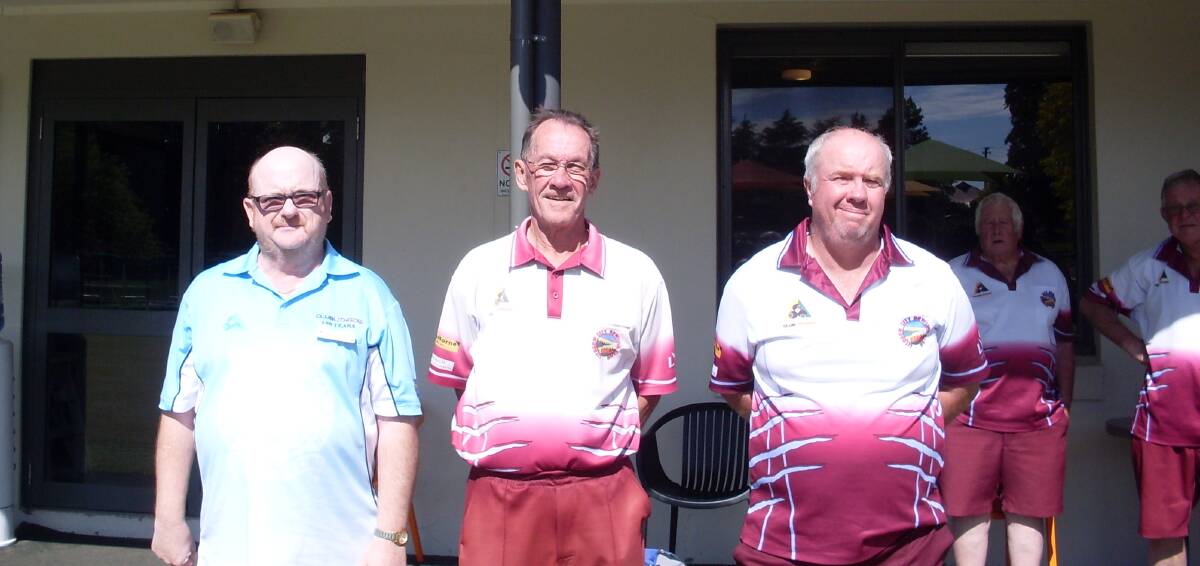 ADDING TO HIS TROPHY CABINET: Skip Jeff Madden (centre) and his partners Richard Forbes and Dave Robson following their victory in the Lithgow City Men's Bowling Club's club triples title. Photo: JIM KELLY.
