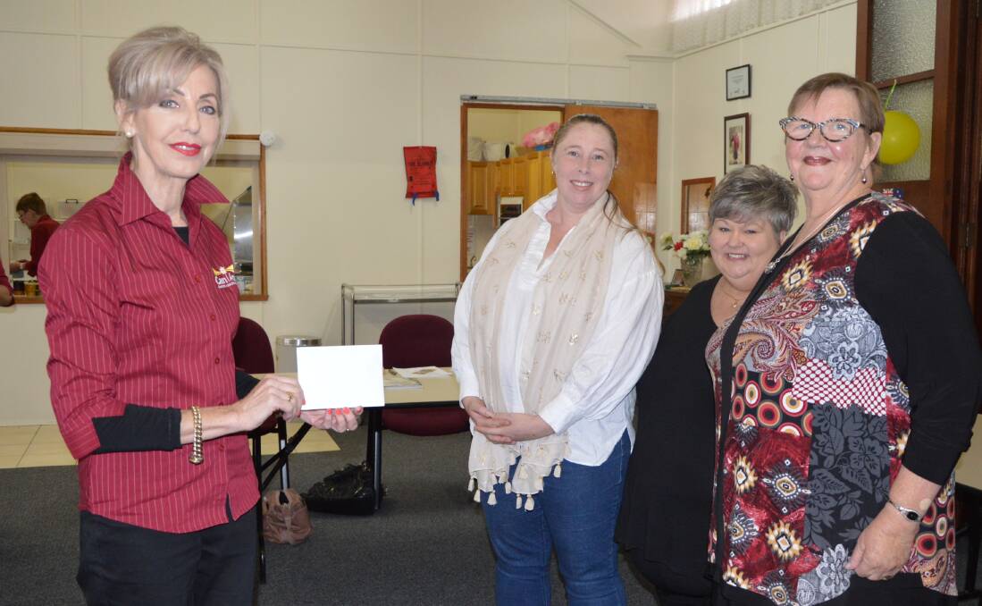 Can Assist Lithgow president Maree Statham received a cheque from fundraisers Rachel Ford, Tanya Slaven and Jannine Smith. Photo: ALANNA TOMAZIN.