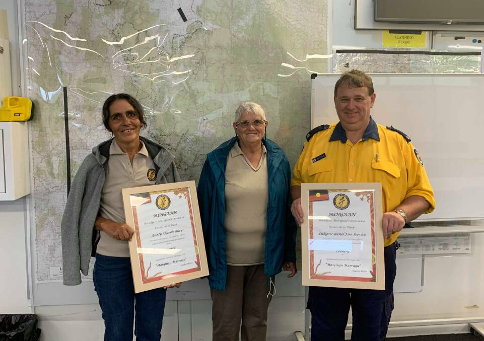 THANK YOU: Mingaan Wiradjuri Aboriginal Corporation's Aunty Sharon and Aunty Helen Riley with Chifley Lithgow RFS Inspector Mick Holland. Picture: ALANNA TOMAZIN.