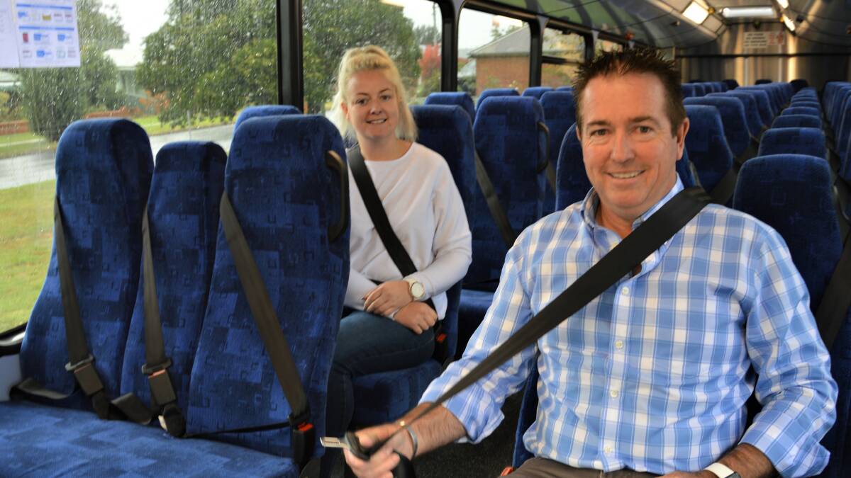 BUCKLE UP: Bathurst MP Paul Toole tests out the seatbelts. Picture: SUPPLIED.