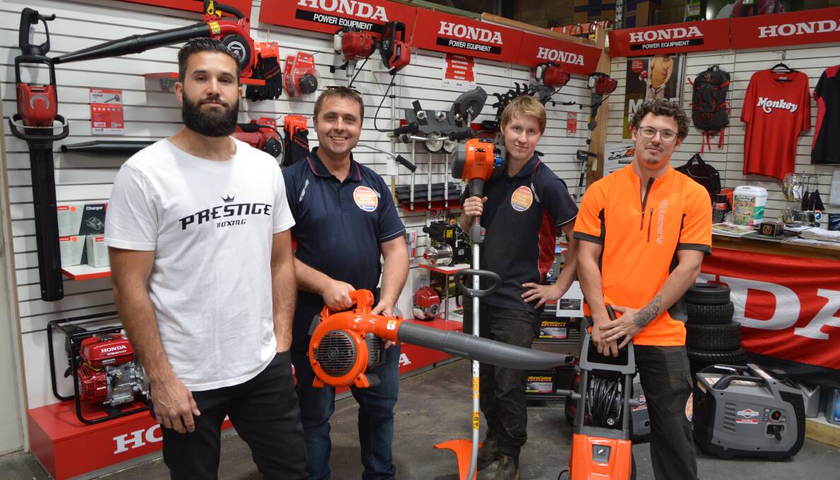 HELPING HAND: Prestige Boxing owner Roger Spence and Erin's Outdoor Quality Power Centre owner Shannon Kus with employees Luke Smith and Carson Hollier. Photo: ALANNA TOMAZIN.