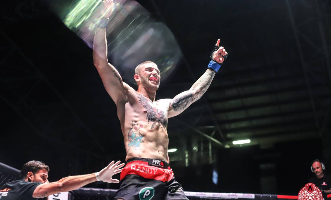 VICTORY: Blake Sheppeard takes the win via TKO. Picture: Undefeated Images, Robyn Lambird. 