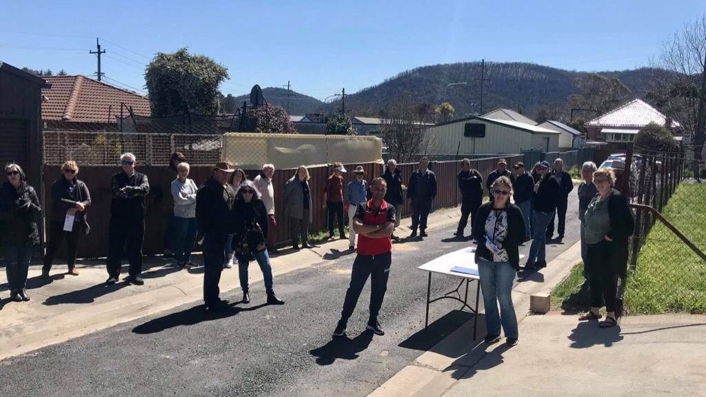 UNHAPPY: Neighbours gather in Lithgow to show their opposition to the plan. Photo: LEN ASHWORTH. 