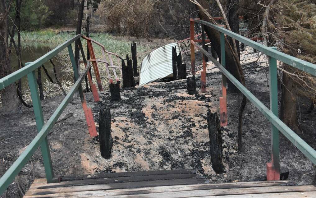 DESTROYED: The boardwalk aftermath of the Gospers Mountain megafire. Photo: ALANNA TOMAZIN.